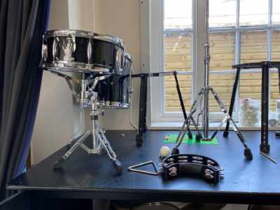 Storage of musical instruments in the performance hall